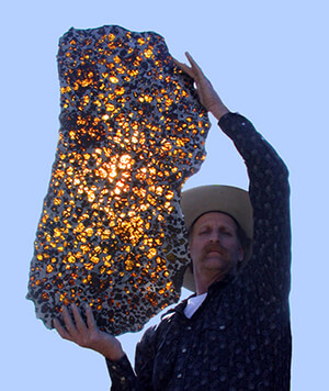 Marvin Killgore Holding Fukang Meteorite