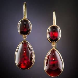 Antique Garnet Drop Earrings. Glowing cabochon garnet drops swing-and-sway, to-and-fro and back-and-forth from matching ovals in these delightful, late 19th~early 20th century Bohemian (Czechoslovakian) ear drops crafted in 14K yellow gold.